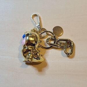 Tyrannosaurus gold pendant keychain